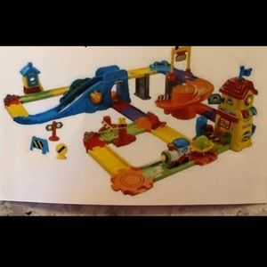 VTech train set(70 PCs), Launch & Play, 4 Smart wheel cars batteries included